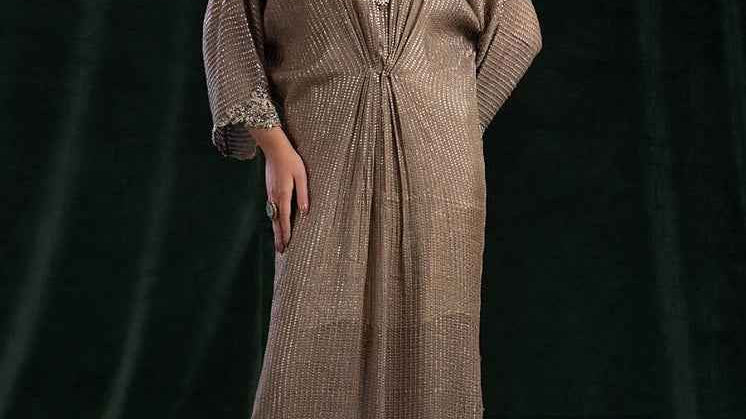 Authentic Khuda Baksh distributor showcasing elegant brown partywear for ladies.
