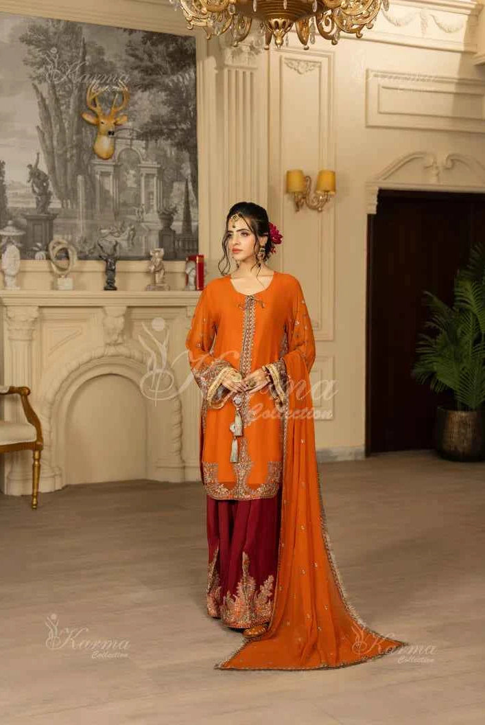 Neon orange silk Pakistani women's short shirt with farshi shalwar side view