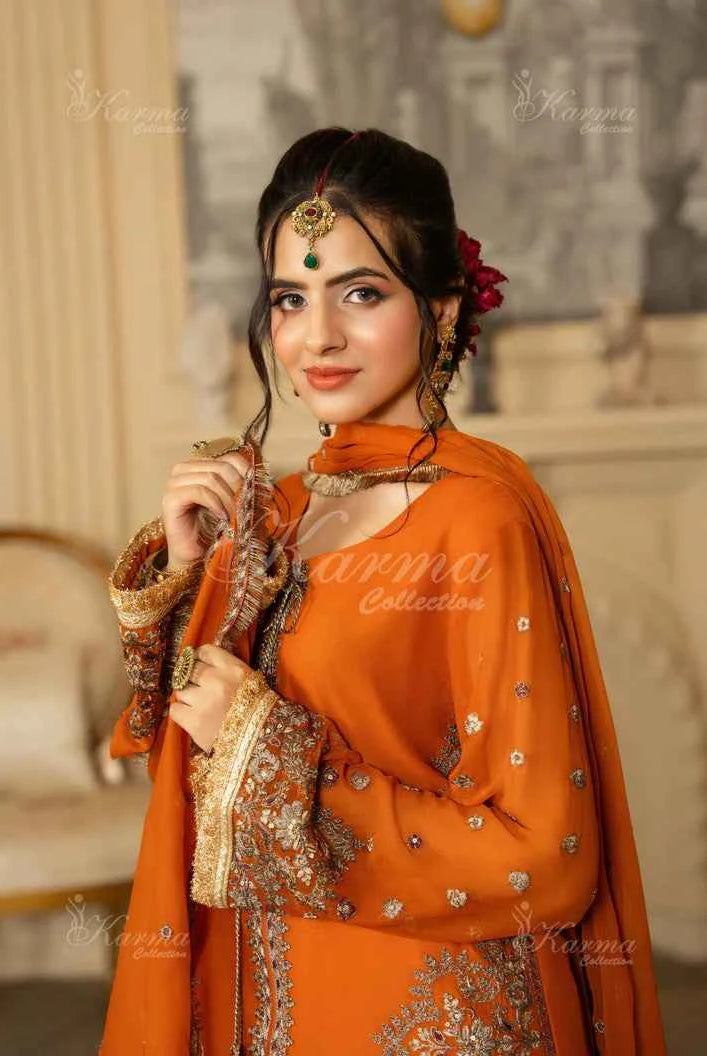 Pakistani women's neon orange silk short shirt farshi shalwar full view