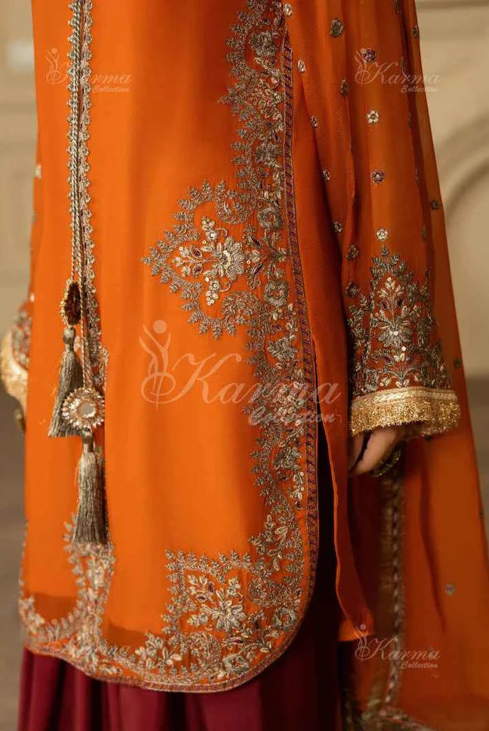 Pakistani women's neon orange silk short shirt farshi shalwar back view