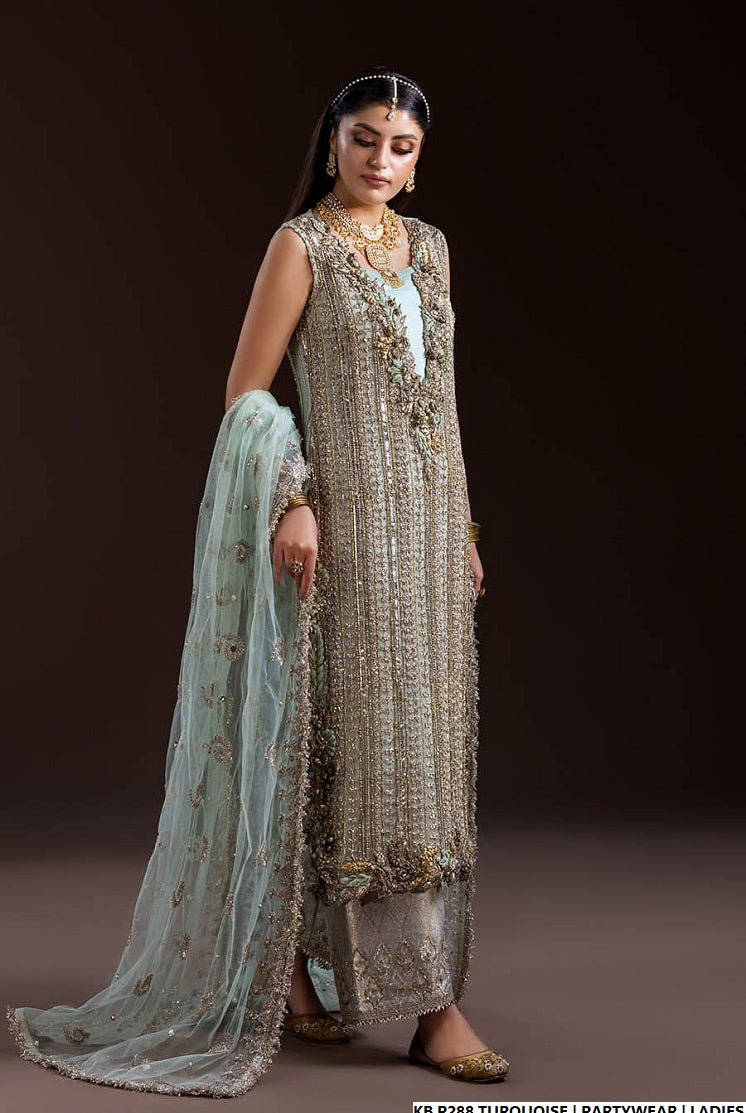 Turquoise hand embroidered Pakistani women's luxury suit side view