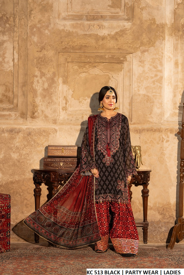 Sindhi balochi embroidered short shirt farshi shalwar ebony black - Pakistani women's traditional cultural festive outfit with ajrak chiffon dupatta front view