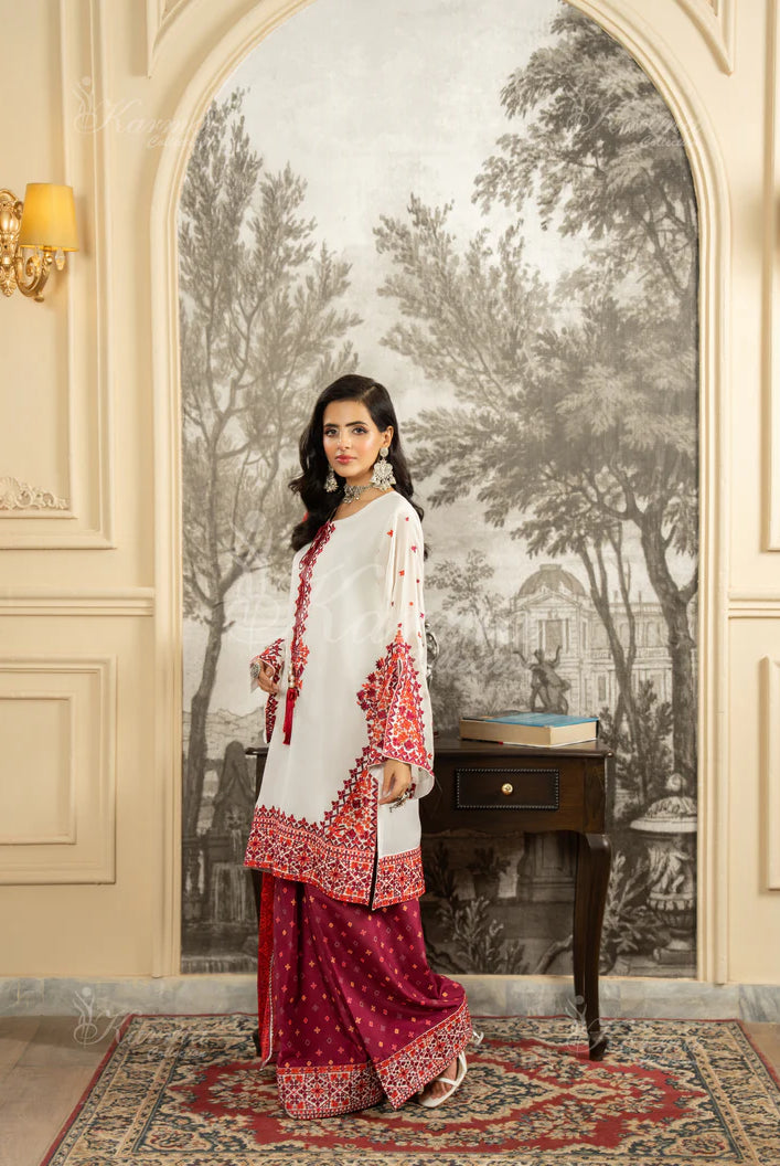 Pink silk Pakistani women's short shirt with farshi shalwar side view