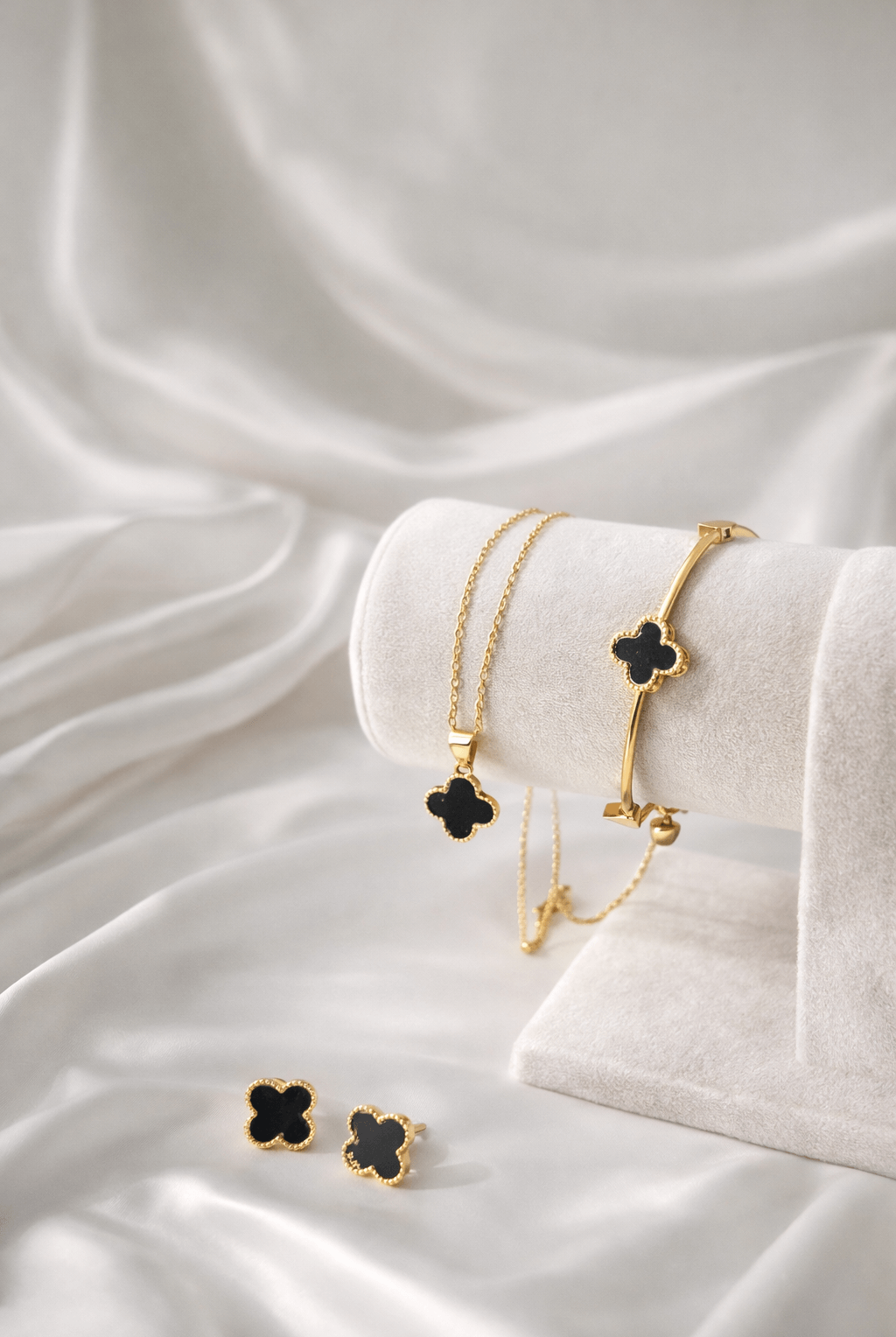 Black clover luxury jewelry set - Pakistani women's elegant gold plated bracelet necklace and earrings with black clover charm front view