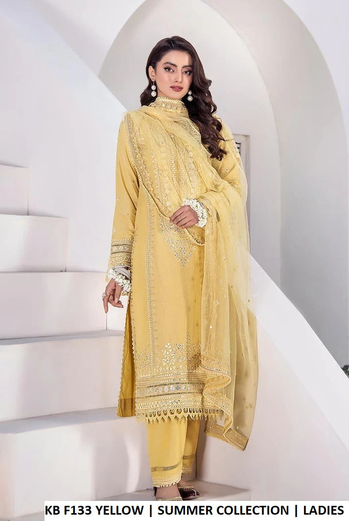 Yellow pure cotton Pakistani women's hand embroidered outfit side view
