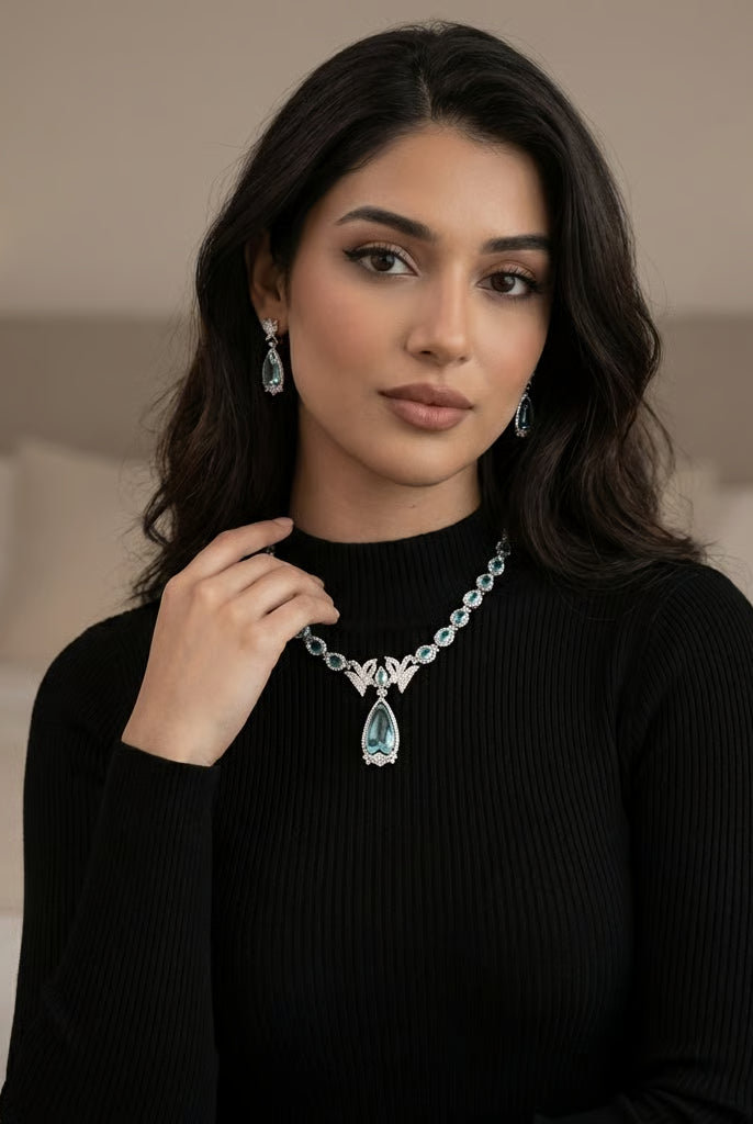 Pakistani women's emerald bird motif necklace set side view