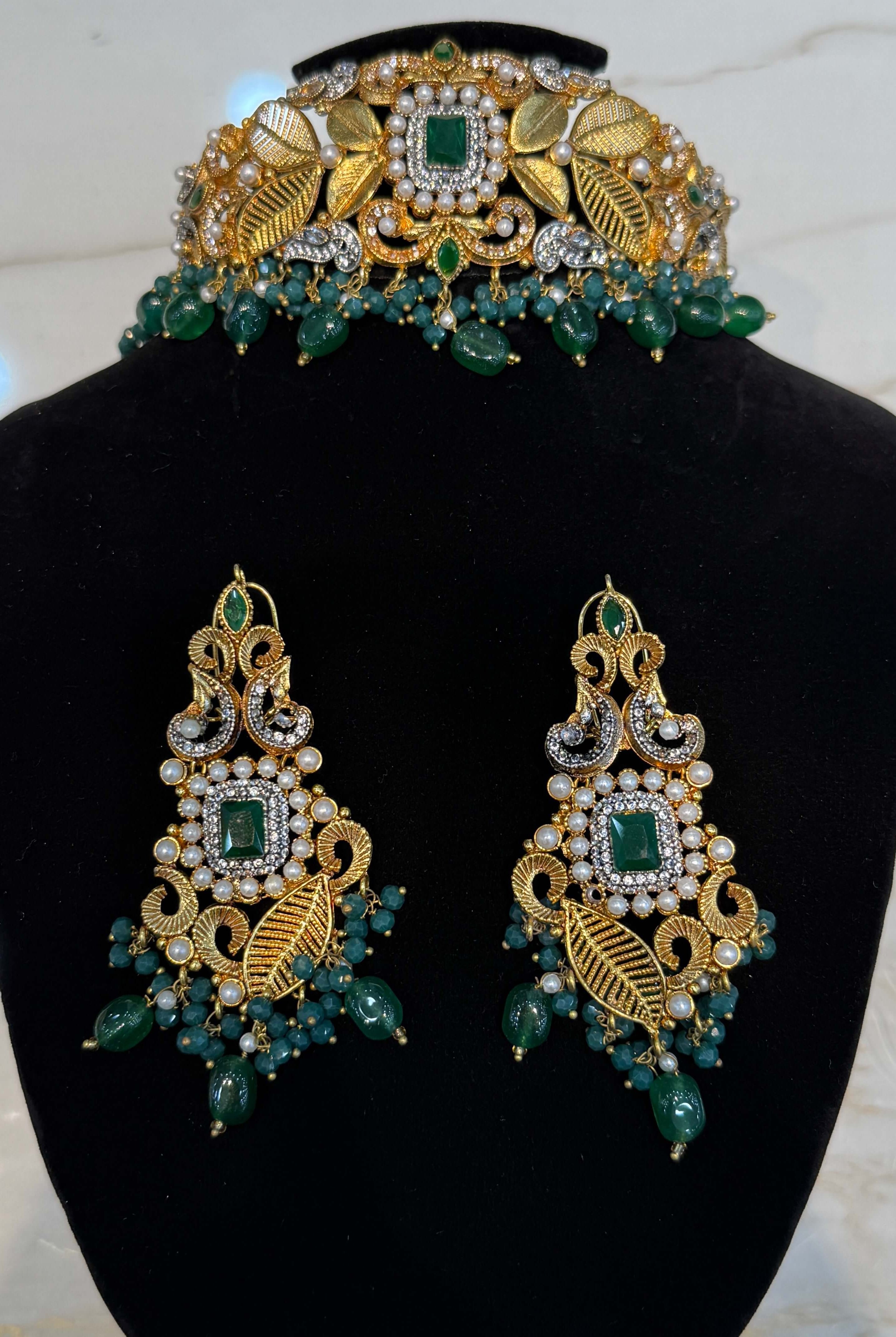 Pakistani women's emerald leaf pearl choker bridal set detail view