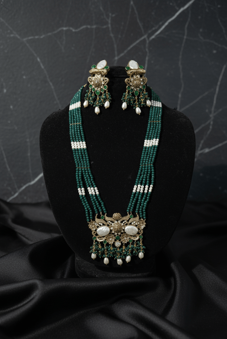 Emerald pearl beaded necklace set - Pakistani women's luxury bridal jewelry with emerald stones and pearl beads front view