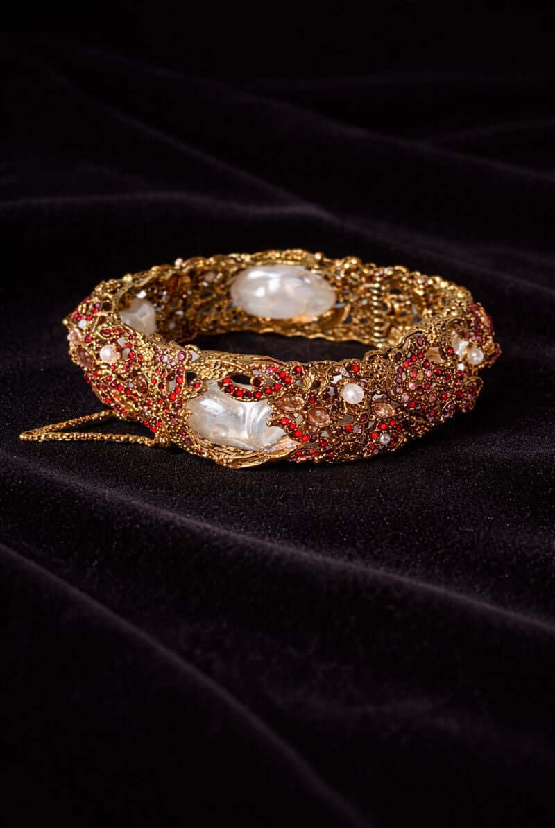 Ruby crystal baroque pearl antique gold bracelet - Pakistani women's luxury bridal jewelry with filigree detailing and ruby red crystals front view
