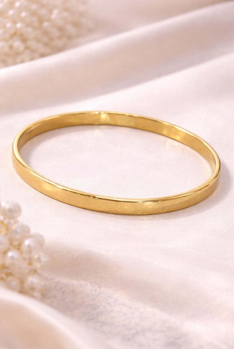 Classic gold plain bangles pair - Pakistani women's elegant everyday jewelry with smooth gold tone finish front view