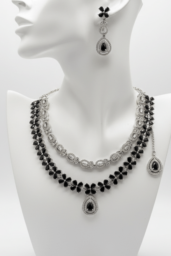 Noir opulence evening jewelry set - Pakistani women's luxury formal jewelry with black stones and gold tone evening set front view