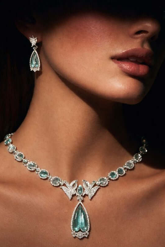 Pakistani women's emerald bird motif necklace set detail view