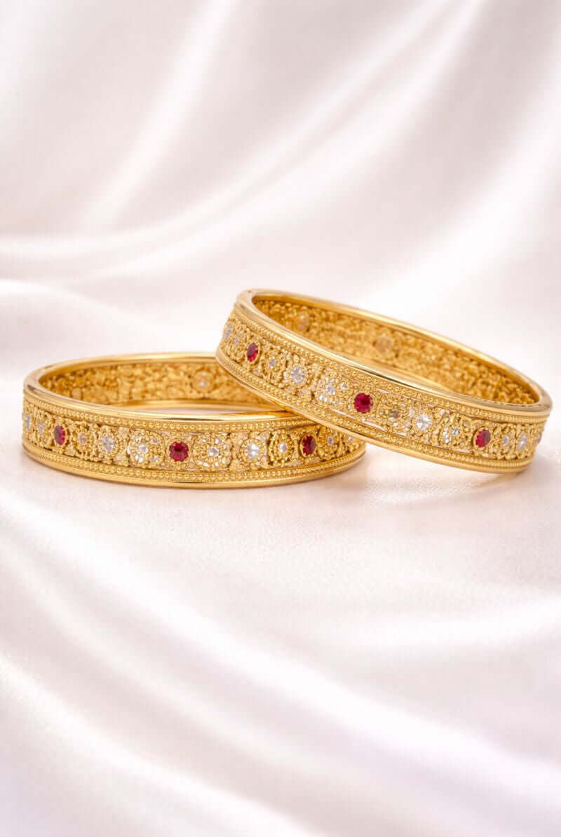 Zaria heritage bangles pair - Pakistani women's traditional bridal jewelry with intricate gold tone detailing front view