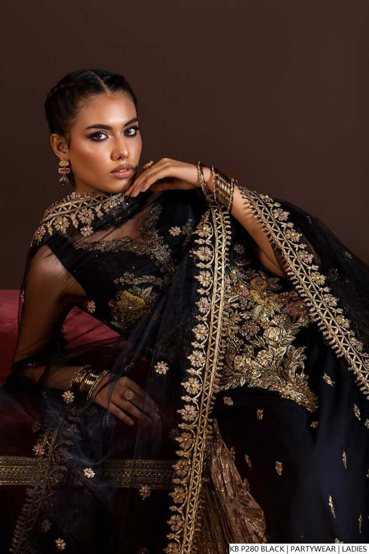 Khuda Baksh collection featuring an elegant black partywear outfit with exquisite embroidery.