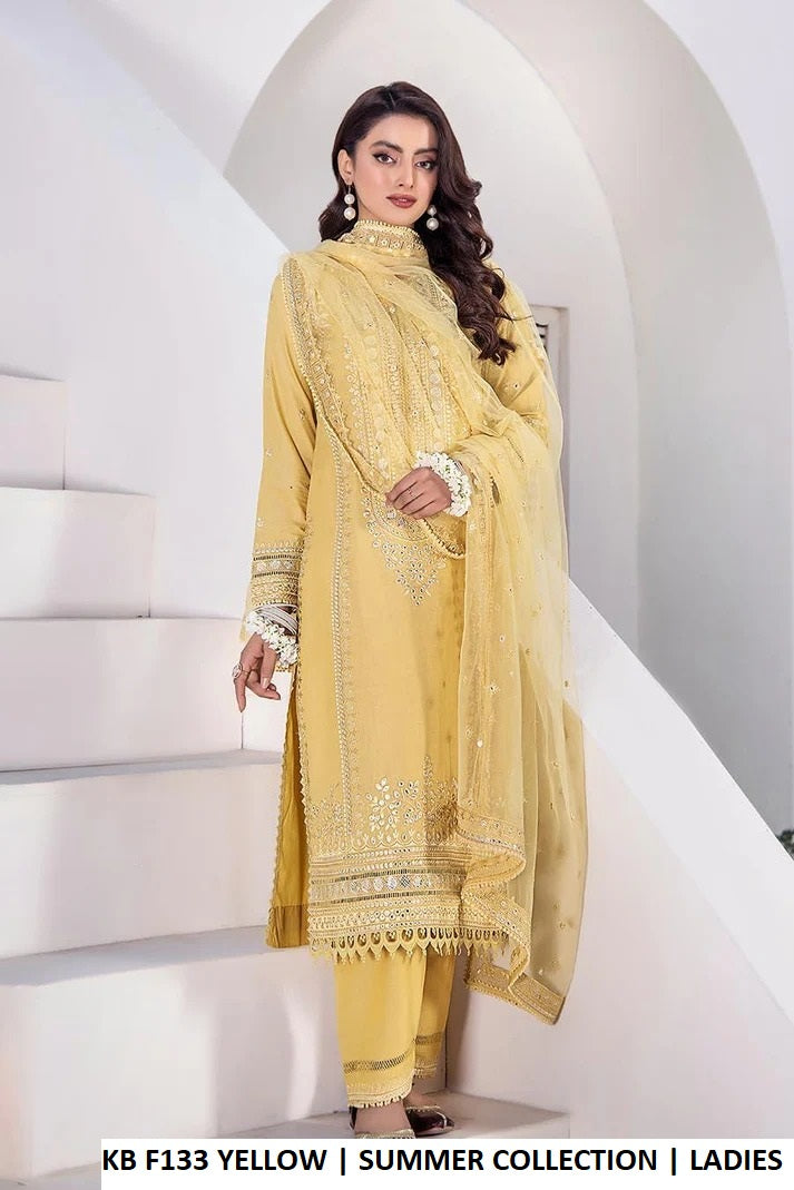 Yellow pure cotton Pakistani women's hand embroidered outfit side view