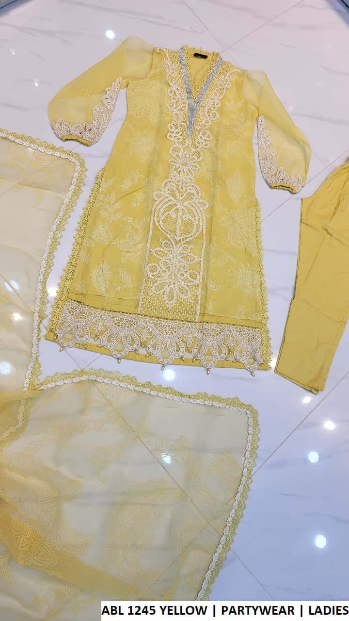 ABL 1245 YELLOW luxury party wear dress for women showcasing organza shirt and cotton trouser by Amir Boutique Pakistan.