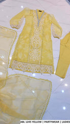 ABL 1245 YELLOW luxury party wear dress for women showcasing organza shirt and cotton trouser by Amir Boutique Pakistan.