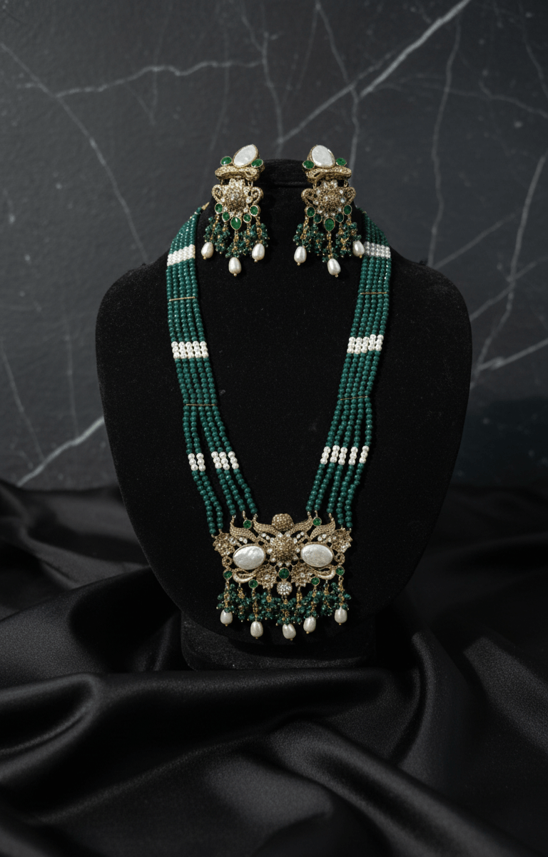 Emerald pearl beaded necklace set - Pakistani women's luxury bridal jewelry with emerald stones and pearl beads front view