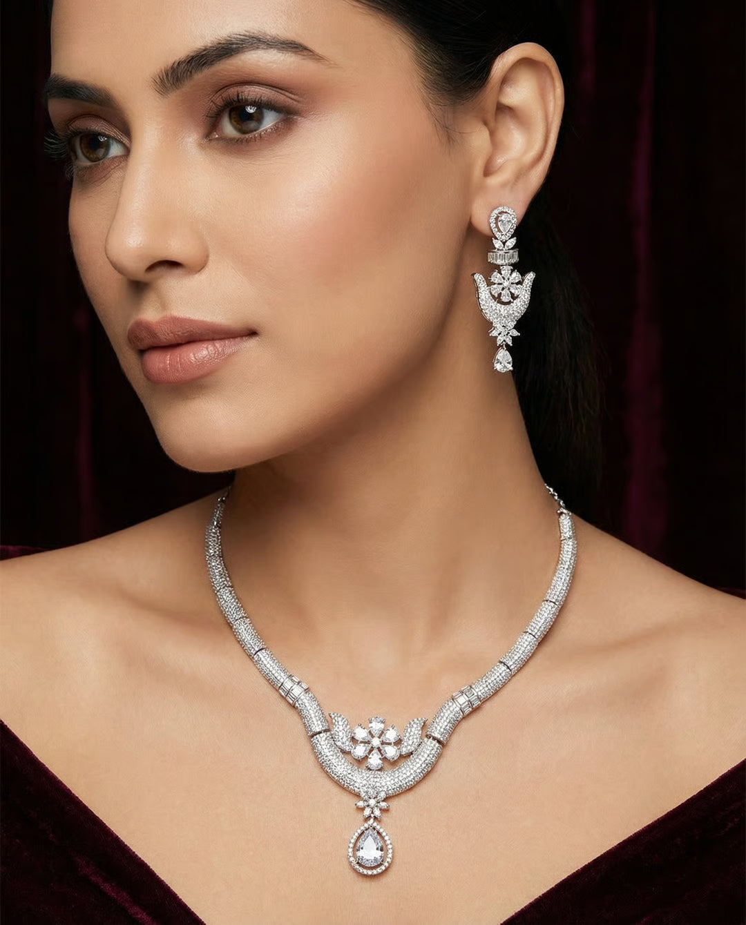 Crimson royalty necklace and earring set - Pakistani women's luxury bridal jewelry with ruby red teardrop stones and zircon clusters front view