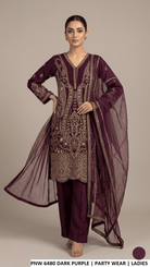 Model wearing PNW 6480 DARK PURPLE luxury party wear dress for women from Amir Boutique Pakistan.