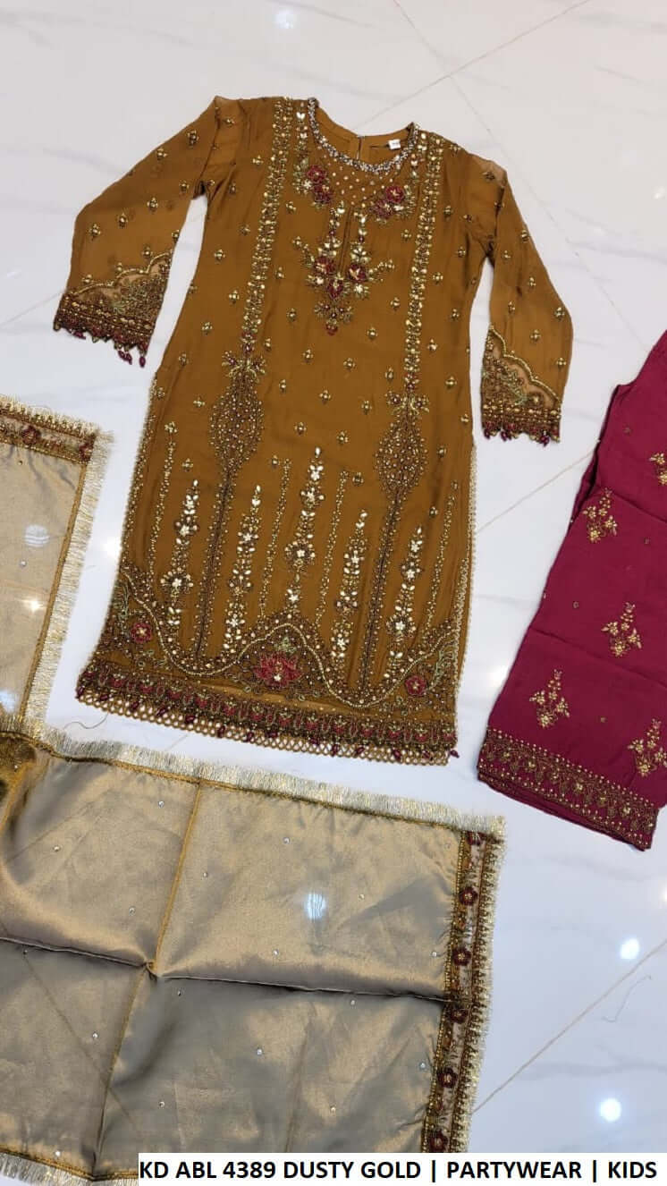 KD ABL 4389   DUSTY GOLD luxury party wear dress for kids from Amir Boutique Pakistan.